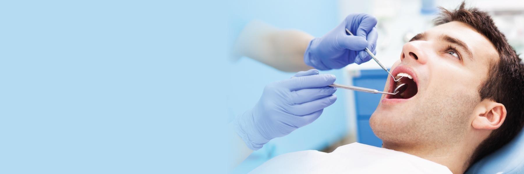 Man getting a dental exam | Vienna VA