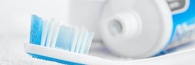 picture of a toothbrush and toothpaste in vienna va