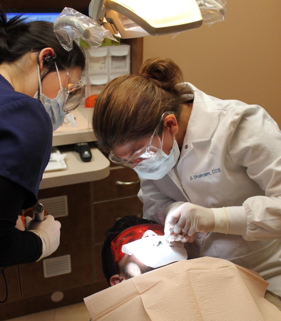 Dr. Shahram performing an examination in Vienna, VA