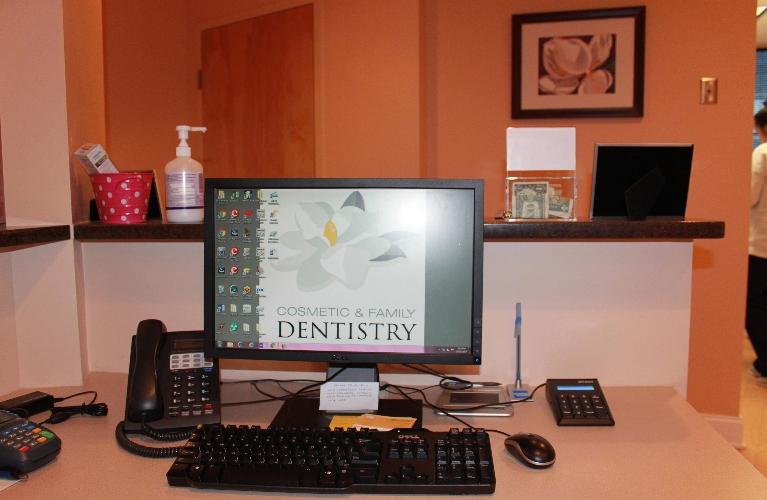 our office computer at our front desk | dentist in vienna, VA