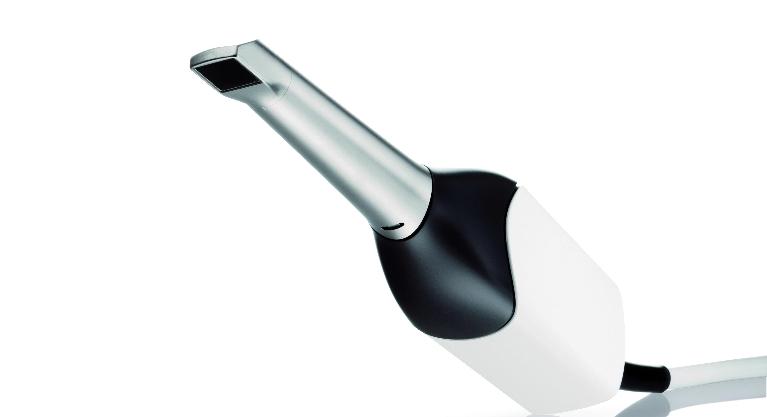 a dental digital scanner over a white backdrop | dentist in vienna
